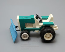 Советская детская игрушка «Трактор «Петруша» с прицепом», пластмасса, Завод «Северный пресс», 1980-е годы