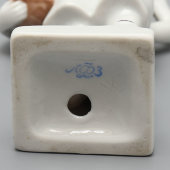 Статуэтка «Юный вратарь в желтой майке» (Футболист), скульптор Венкова И. А., фарфор ЛФЗ, 1960-е