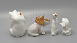 Комплект статуэток по басне И. А. Крылова «Квартет» (золотой):​ осел, козел, мартышка и косолапый мишка, скульптор Воробьев Б. Я., ЛФЗ, 1950-60 гг.