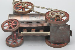 Старинная игрушка «Паровой тяговый двигатель» на деревянной подставке, компания Bing Works, Нюрнберг, Германия, 1918-1932 гг.