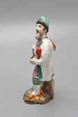 Старинная фарфоровая статуэтка «Мужик с лаптями», завод Кудинова, 2-я четв. 19 в.