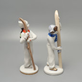 Комплект статуэток «Лыжница» и «Лыжник», скульптор Столбова Г. С., художник Лупанова Е. Н.​, ЛФЗ