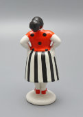 Статуэтка «Сплетница» (Склочница) в полосатой юбке из группы «Разговор», авторы Сморгон Л. Н., Дегтярев А. В., ЛЗФИ, фарфор СССР
