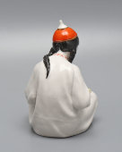 Статуэтка «Калмычка с книгой», скульптор Богданова О. М., фарфор, Дулево, 1960 г.