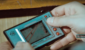 Микропроцессорная игра с часами и будильником «Автослалом» из серии «Электроника ИМ-23», СССР, 1991 г.