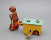 Заводная механическая игрушка «Мишка на велосипеде с прицепом», СССР, 1960-70 гг.