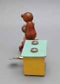 Заводная механическая игрушка «Мишка на велосипеде с прицепом», СССР, 1960-70 гг.